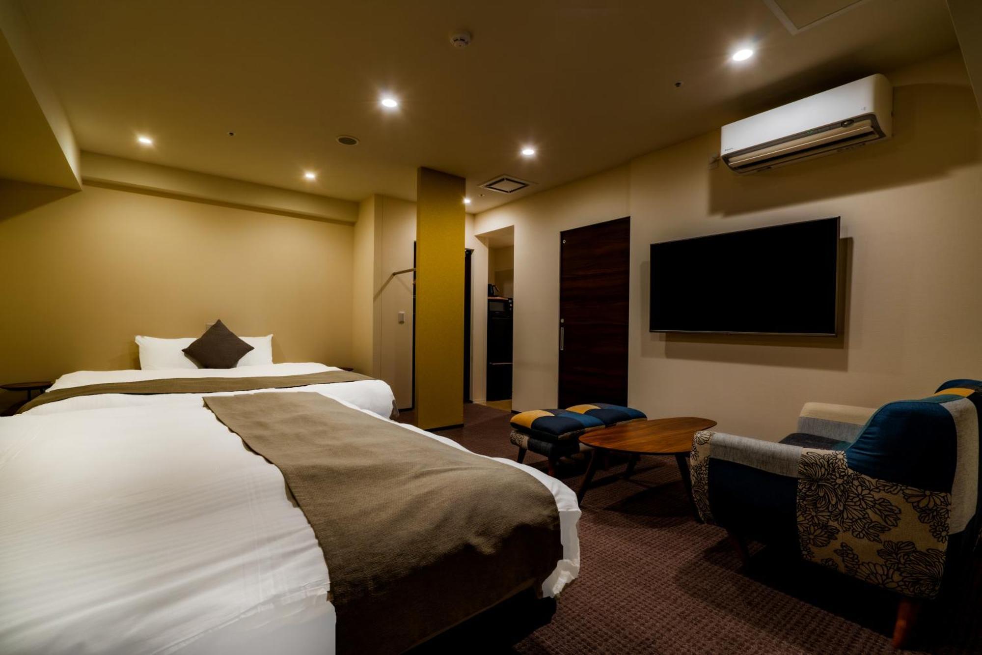 Randor Hotel Sapporo Suites Szoba fotó A room at the hotel