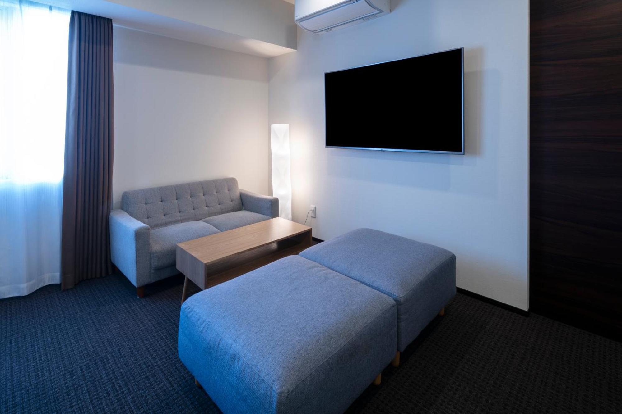 Randor Hotel Sapporo Suites Szoba fotó A room at the hotel