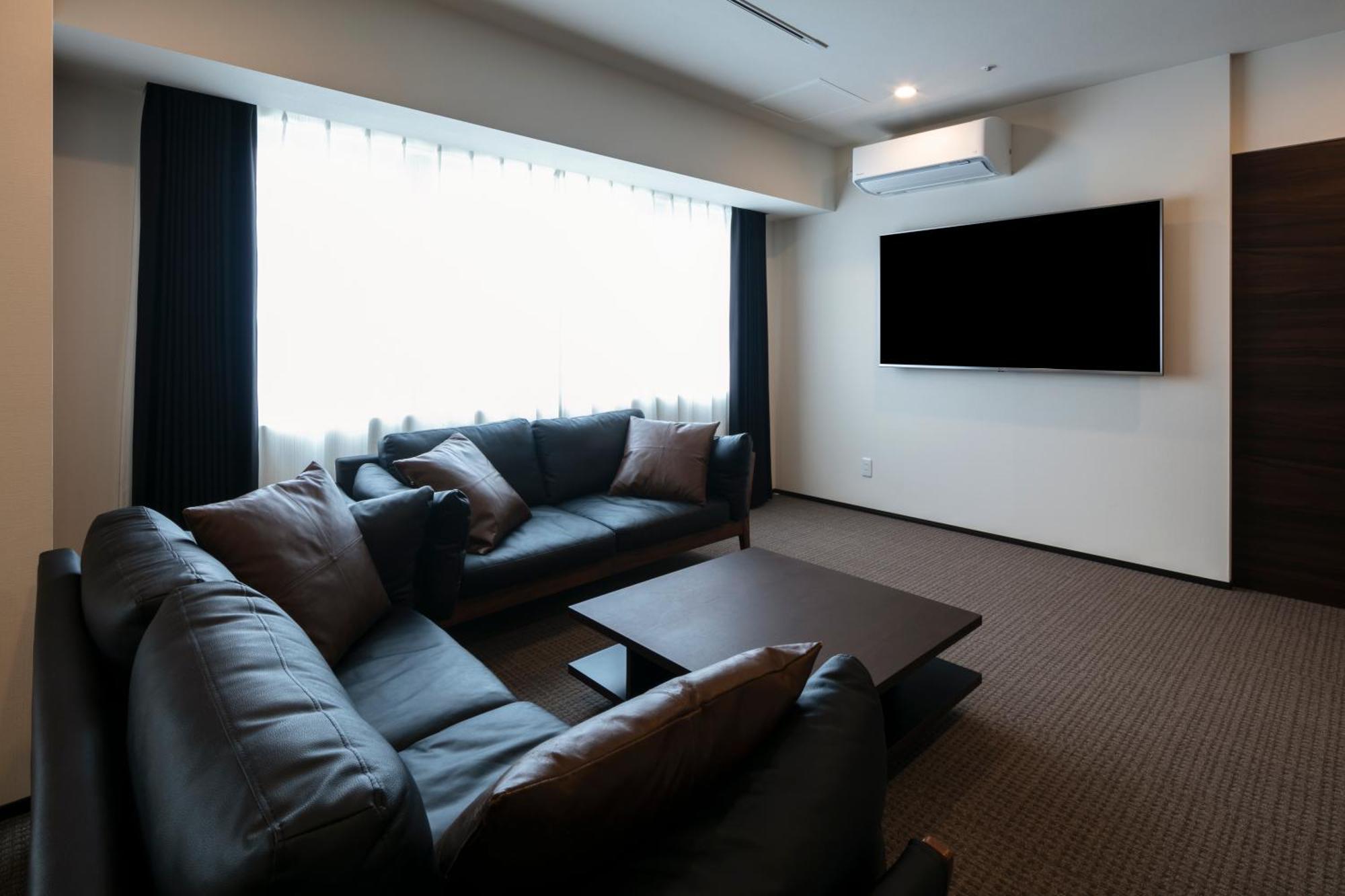 Randor Hotel Sapporo Suites Szoba fotó A living room in a Japanese apartment