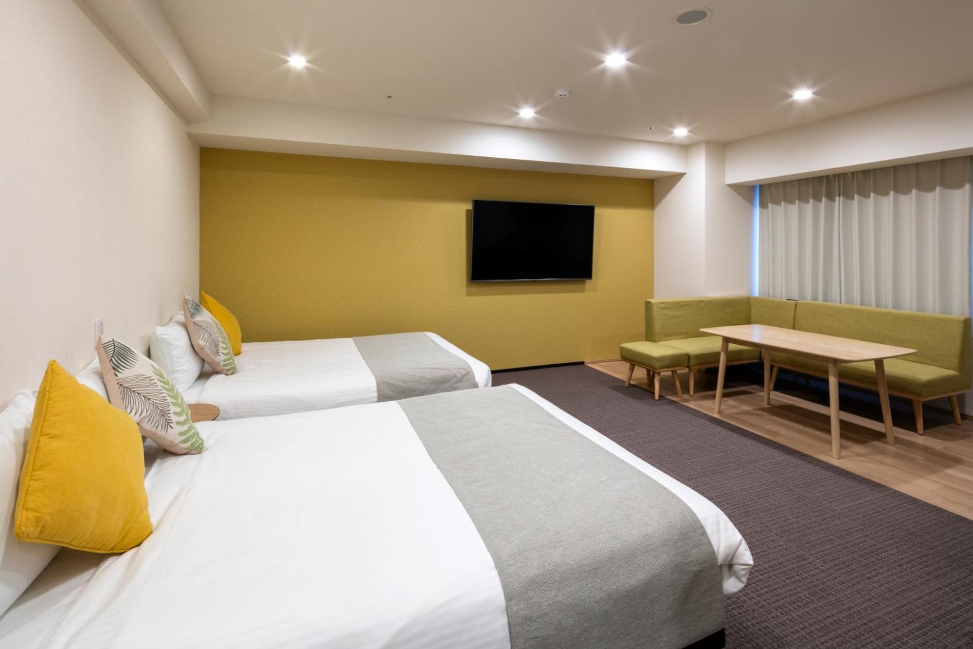 Randor Hotel Sapporo Suites Szoba fotó A room at the hotel
