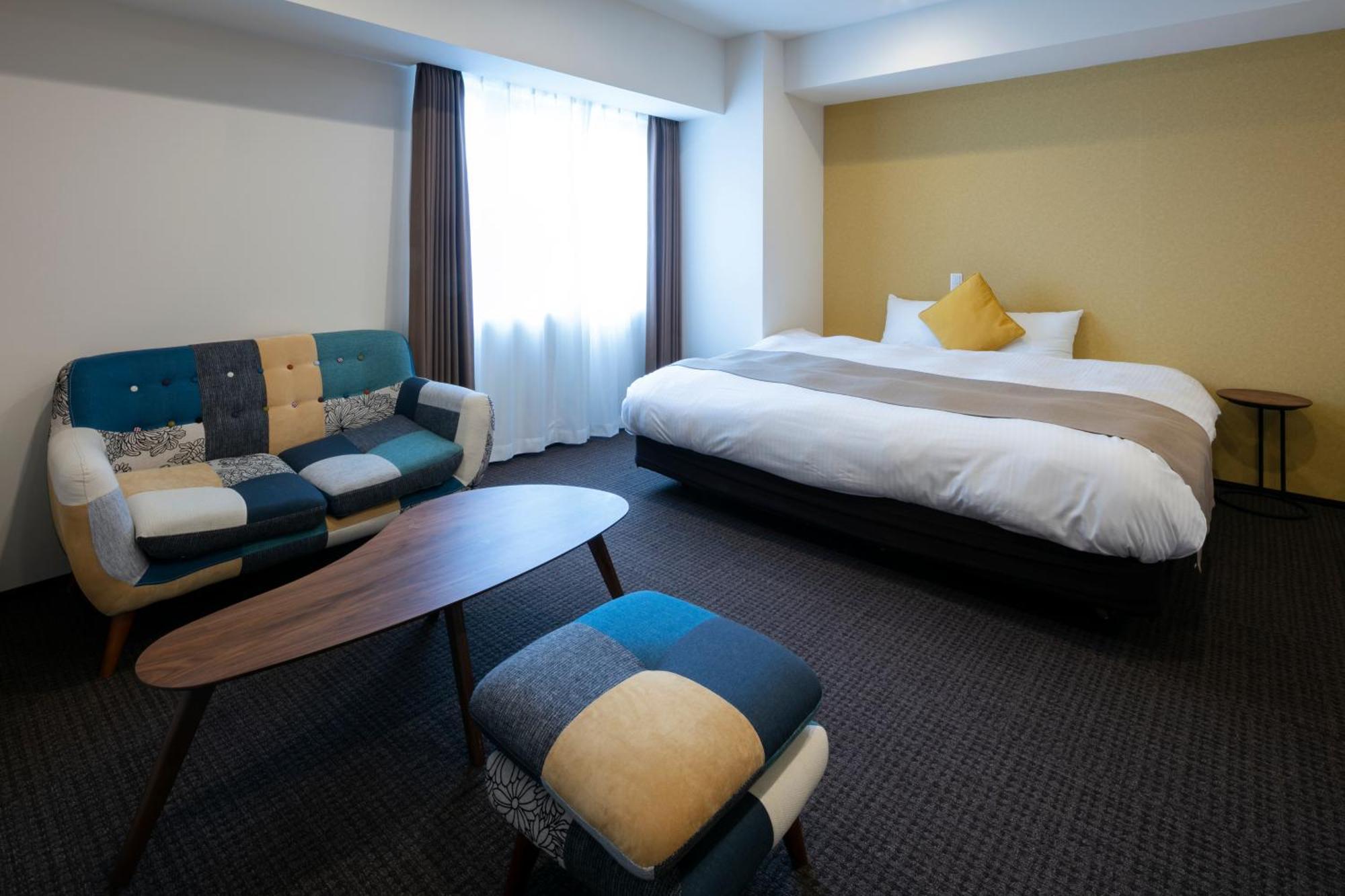 Randor Hotel Sapporo Suites Szoba fotó A room at the hotel